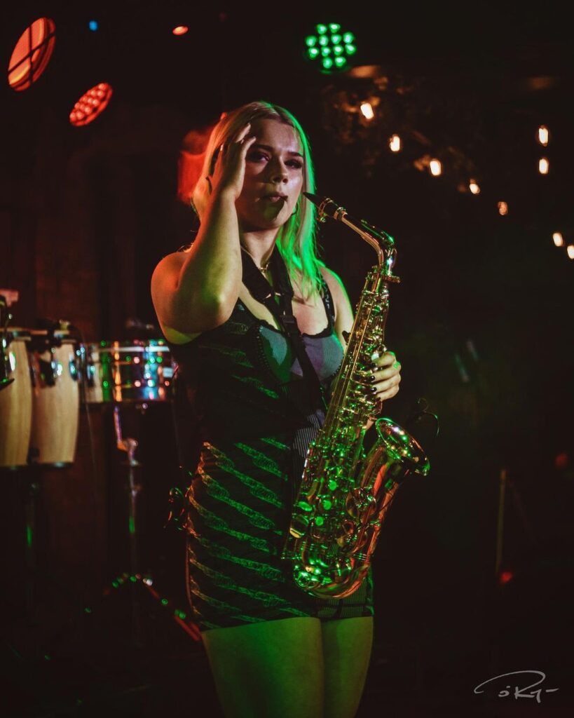 Female Saxophonist Performs at Corporate Event in Cork